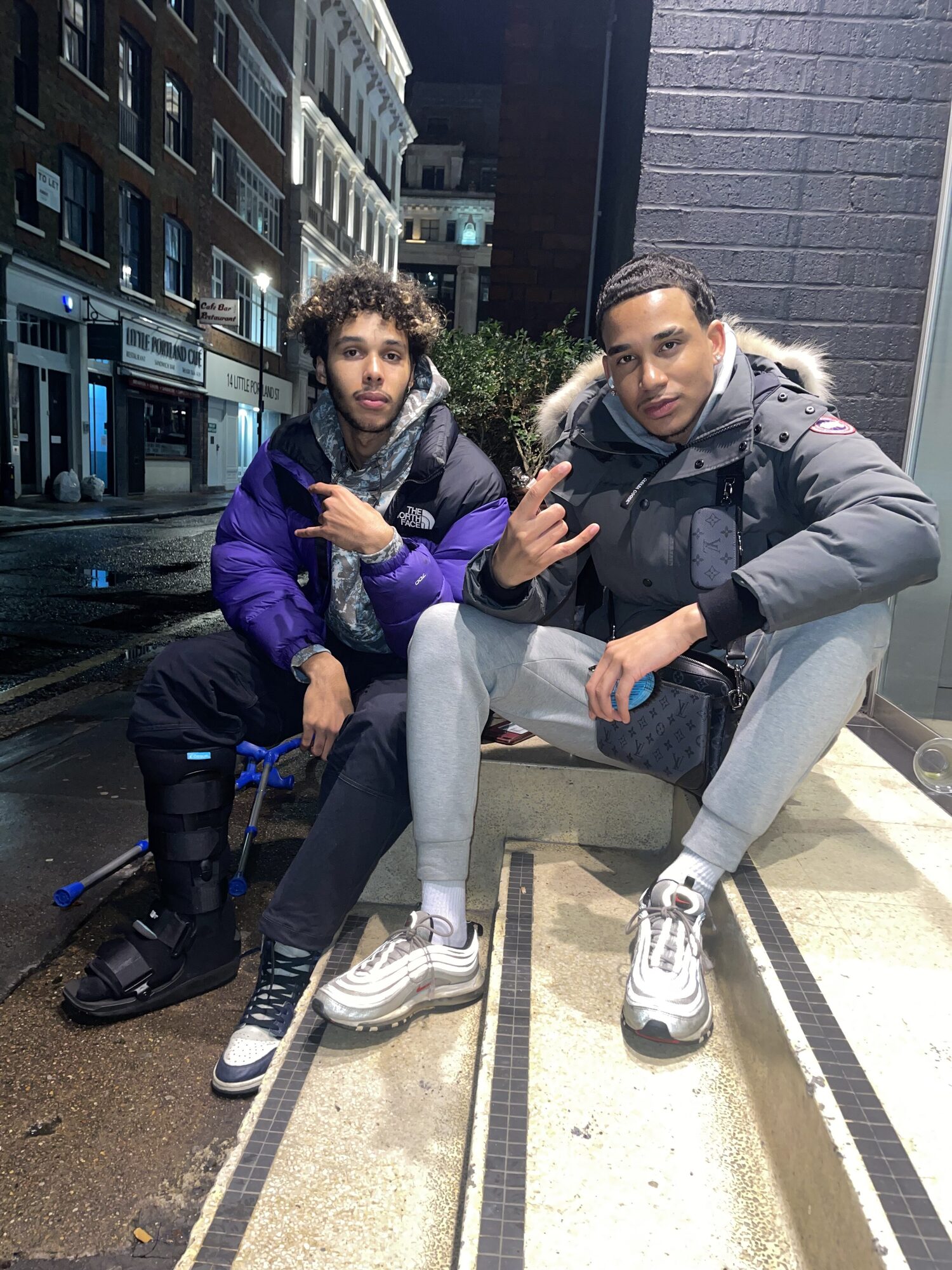 Joshua Arthur (JJDREAMSS) · London — Off shift near Oxford Street, sat on the steps with a colleague